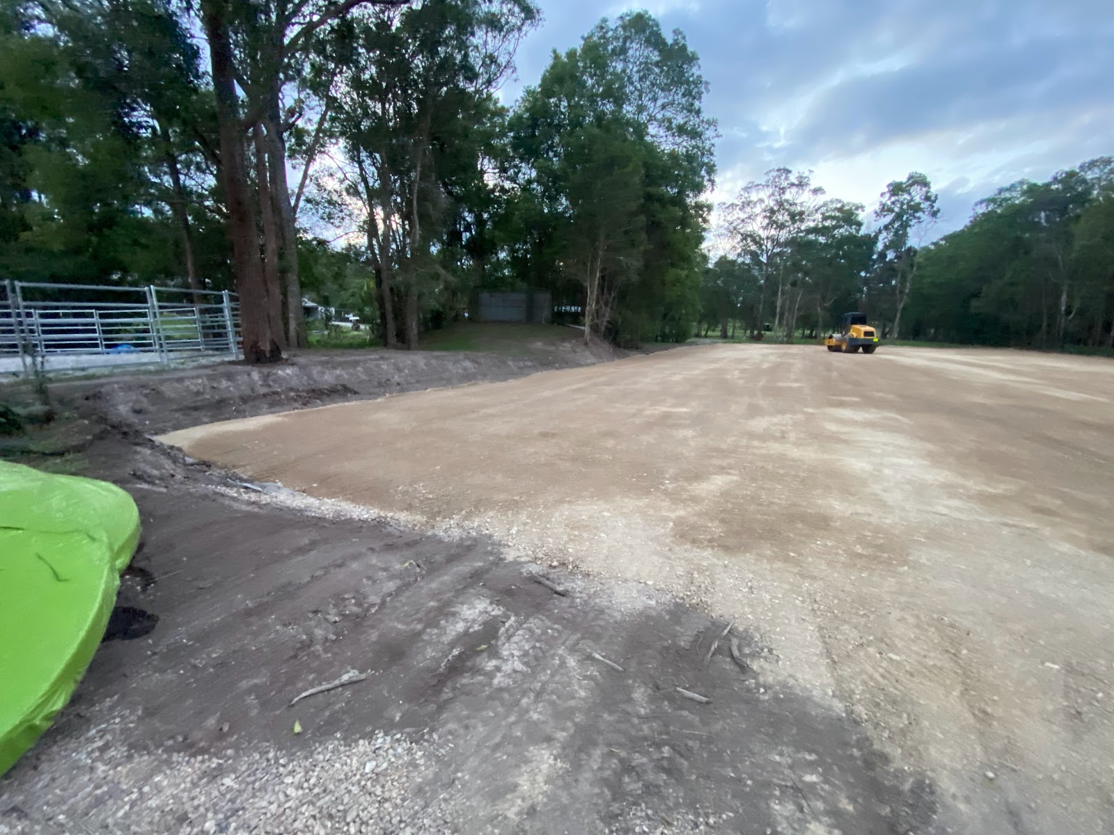 Grader laying road base